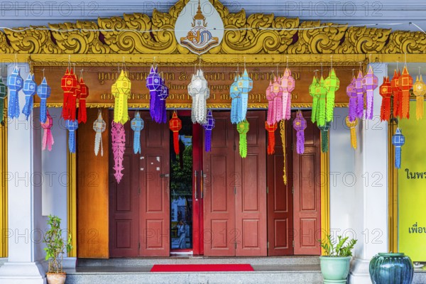 Decorated entrance to Wat Yannawa Buddhist temple decorated with colored lanterns, Bangkok, Thailand's metropolis, Thailand