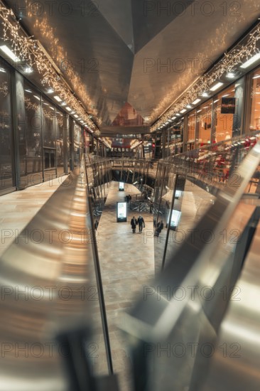 Modern architecture of a shopping mall, rich in reflections and lighting, London, England, Great Britain