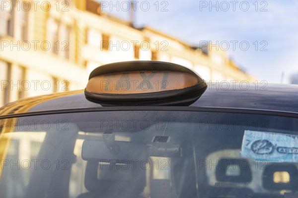Close-up of a taxi roof sign on a London taxi, London, England, Great Britain