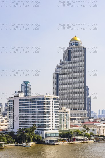 The luxury Mandarin Oriental Hotel on the Chao Phraya River, the State Tower in the back, Bangkok, Thailand's metropolis, Thailand