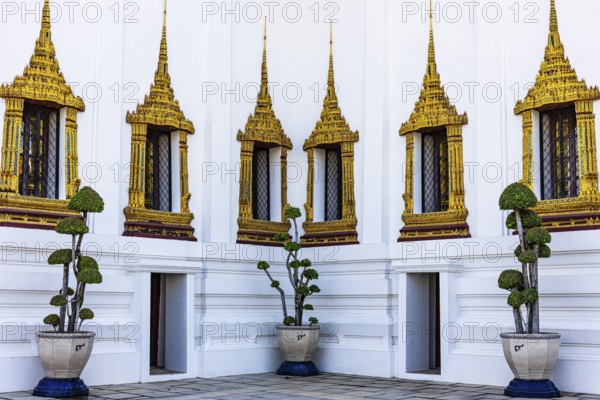 The Grand Royal Palace, richly decorated and gilded windows at the Dusit Maha Prasad throne hall, Phra Nakhon, Bangkok, Thailand's metropolis, Thailand