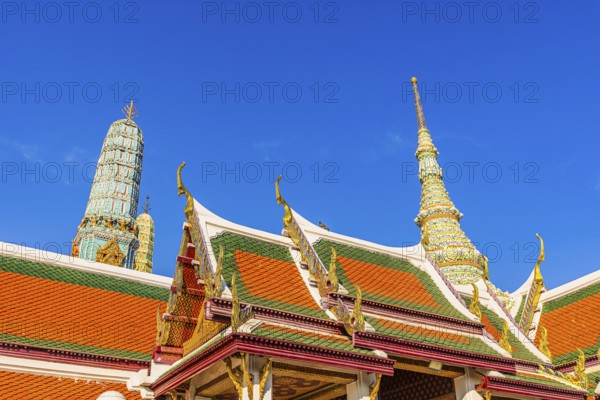 The Grand Royal Palace, Wat Phra Kaeo Buddhist Temple, overlapping roofs with curved chofas, Chedi Temple Tower, in the back the Royal Pantheon, Prasad Phra Thepbidon, Phra Nakhon, Bangkok, Thailand's metropolis, Thailand