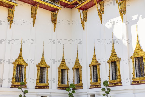 The Grand Royal Palace, richly decorated and gilded windows at the Dusit Maha Prasad throne hall, Phra Nakhon, Bangkok, Thailand's metropolis, Thailand