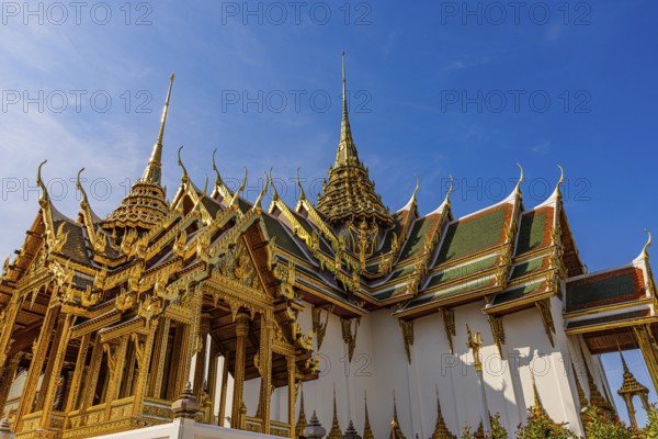The Grand Royal Palace, the main entrance to the Dusit Maha Prasad throne hall with overlapping roofs and curved chofas, Phra Nakhon, Bangkok, Thailand's metropolis, Thailand