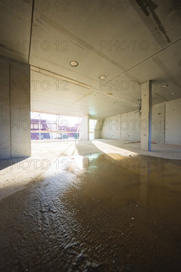 Unevenness and light reflections on the floor of an unfinished room, carpentry, renovation, roof extension, Stuttgart, Germany