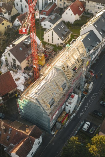 Overview of a large construction site in a residential area during roof renovation, carpentry, renovation, roof extension, Stuttgart, Germany