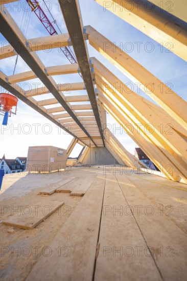 A wooden roof truss with an open sky above. Construction work is in progress, carpentry construction, roof extension, renovation, Stuttgart, Germany