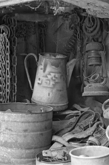 Old coffee pot, chains and utensils in an old cupboard on a former farm, Franconia, Bavaria, Germany