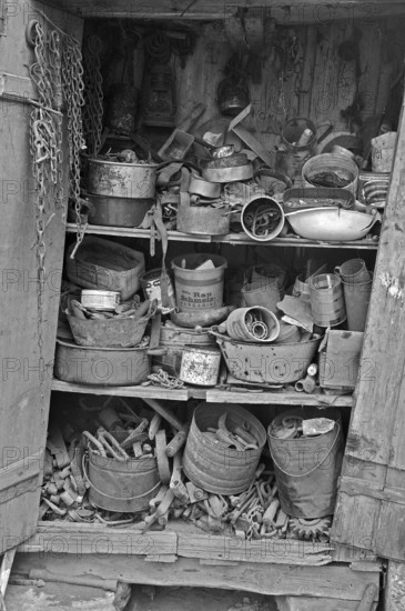 Collected objects in a former rabbit stable on a former Franconian farm, black and white, Mittrelfranken, BNayern, Germany