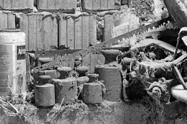 Removed old weights on a hayloft on a former Franconian farm, Bavaria, Germany