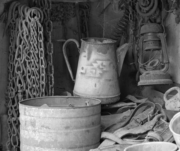Chains, old coffee pot and collected utensils in an old cupboard on a farm, Middle Franconia, Bavaria, Germany