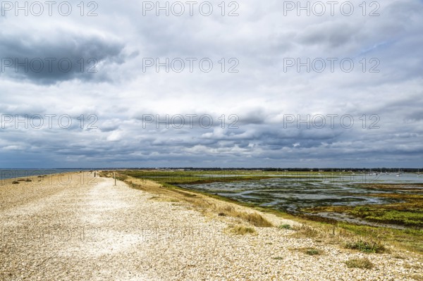 Beach and marshes over Hurst Spit, Milford on Sea, Lymington, Hampshire, UK