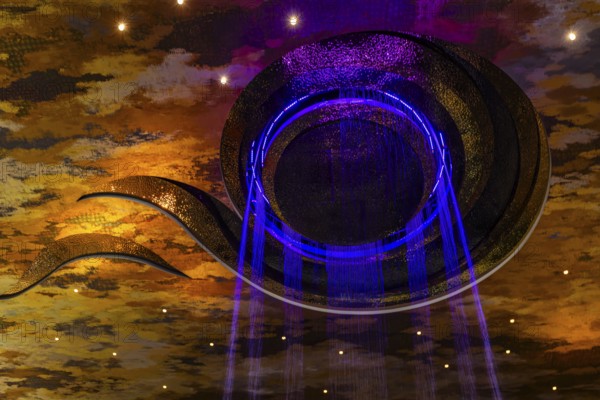 Artificial, brightly lit waterfall, Magic Waterfall, falls from the ceiling of the Iconsiam shopping center, Bangkok, Thailand's metropolis