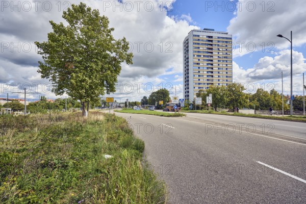 Residential silo, high-rise building, high-rise residential building, road, lanes, trees, grass, cloudy, cumulus clouds, cumulus congestus clouds, Strassburger Straße, Kehl, Upper Rhine Valley, Ortenaukreis, Baden-Württemberg, Germany