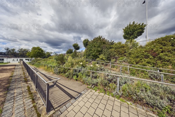 Access to Europe Bridge, park, wooden ramp, stainless steel railing, trees, flower bed, plants, shrubs, path, rainy mood, sunlight, sunny, cloudy, Cumulus congestus clouds, Kehl, Upper Rhine Plain, Ortenau district, Baden-Württemberg, Germany