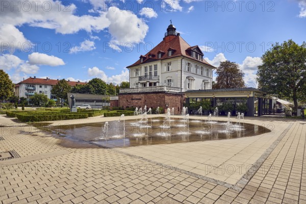 Villa Schmidt restaurant, park, fountain, hedge, lawn, paths, trees, blue partly cloudy sky, cumulus clouds, Kehl, Upper Rhine Plain, Ortenau district, Baden-Württemberg, Germany