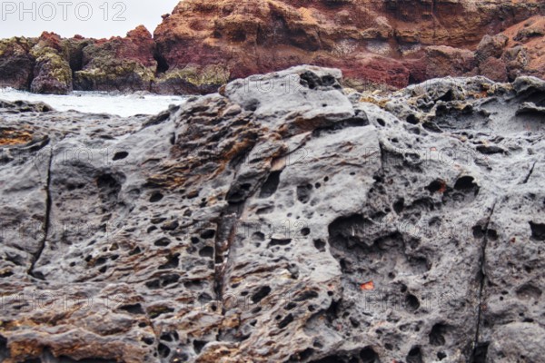 Rock formation with a distinctive rough surface and earthy colors, El Golfo Lanzarote