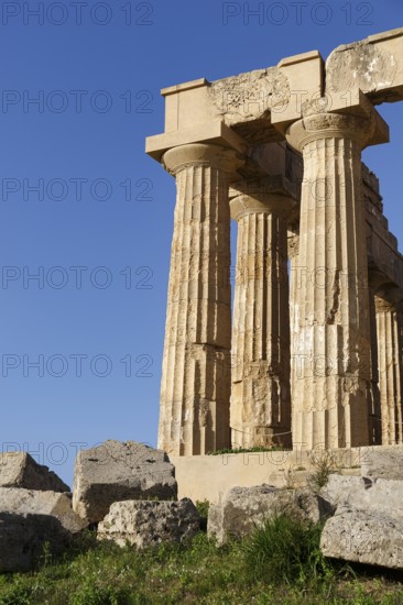 Temple in the ancient Greek city of Selinunte, detail, acropolis, Doric style, columns, archaeological site, restoration, Selinunte, Castelvetrano, Trapani, Sicily, Italy
