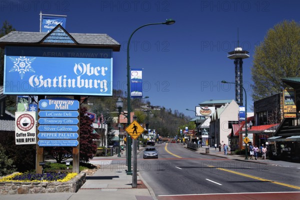 Lively street scene on Gatlinburg's main street in sunny weather, Gatlinburg, Tennessee, USA