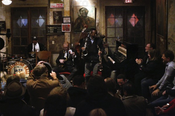 Jazz concert with enthusiastic audience in the historic Preservation Hall, New Orleans, Louisiana, USA
