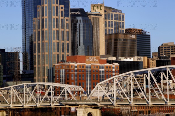 City view with skyscrapers and bridge under clear sky in Nashville, Nashville, Tennessee, USA