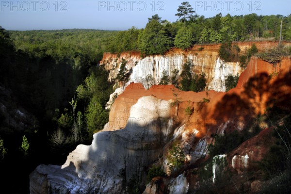 Colourful rock formations in Providence State Park under clear skies, Providence Canyon State Park, Georgia, USA
