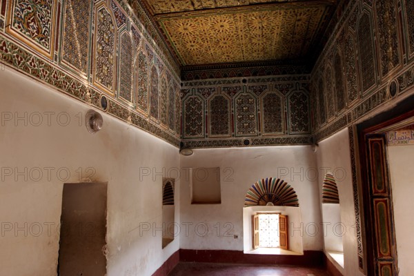 Richly decorated interiors of Kasbah Taourirt with ornate ceilings and traditional Moroccan decorations, Ouarzazate, Drâa-Tafilalet, Morocco