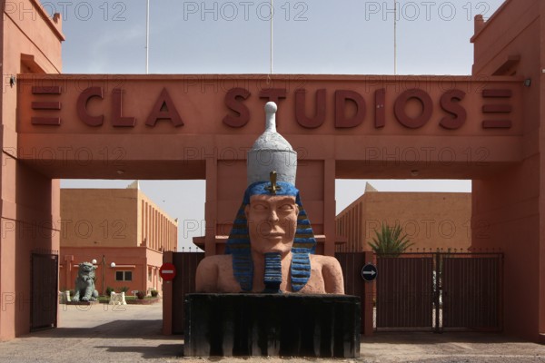 Entrance to CLAS Studios with large pharaoh statue in Egyptian style, Ouarzazate, Morocco