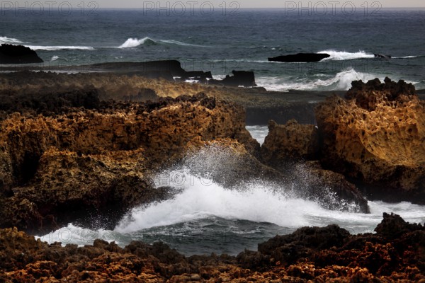 Stormy surf on a rocky coast with turbulent sea, Oulidia, Marrakesh-Safi region, Morocco