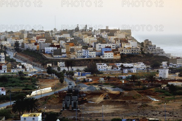 View of the city of Sidi Ifni with densely packed buildings on the coast, Sidi Ifni, Guelmim-Oued Noun region, Morocco