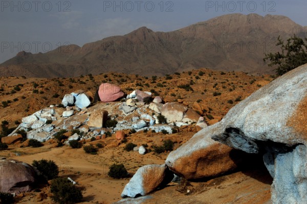 Rocky hills with colour-contrasting stones in the desert area of Tafraoute, Tafraoute, Souss-Massa, Morocco