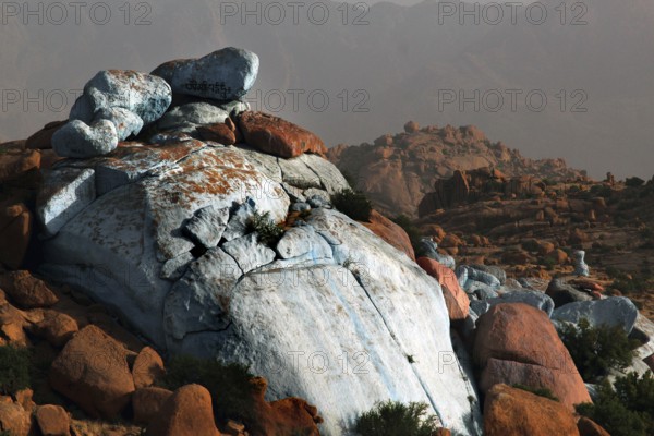 Monumental blue rocks tower over the desert plain in Tafraoute, designed by Jean Verame, Tafraoute, Souss-Massa, Morocco