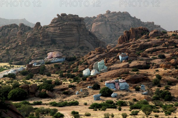 View of painted rocks by Jean Verame in the mountainous landscape of Tafraoute, Tafraoute, Souss-Massa, Morocco