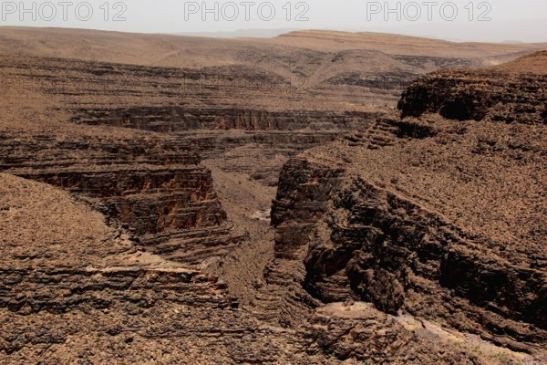 Breathtaking view from the Tizi n'Tinififft Pass into the rugged Drâa Valley, Tizi n'Tinififft, Drâa-Tafilalet region, Morocco