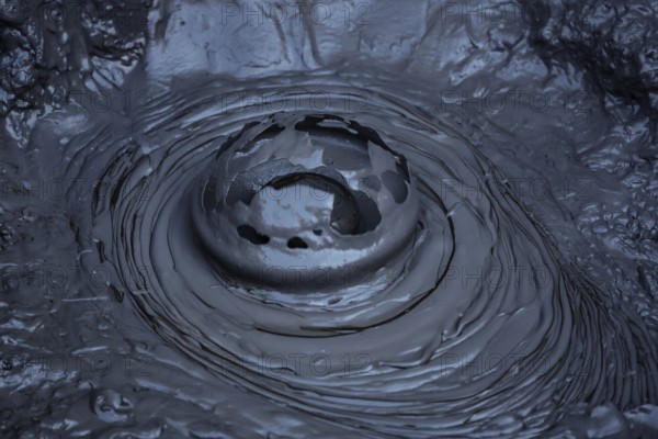 Blowing mud hole in the Whakarewarewa geothermal area in Rotorua, Rotorua, New Zealand