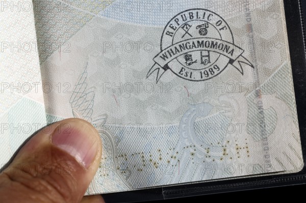 A side look at a stamp in the passport of the Republic of Whangamomona, Whangamomona, New Zealand