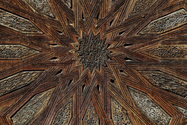 Complex wooden ceiling with geometric patterns in Medersa Bou Inania, Fez, Fès-Boulemane, Morocco