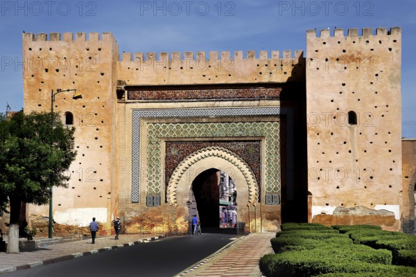 Impressive decorated gate with brick pattern shining in the sun, Meknes, Fès-Meknes, Morocco