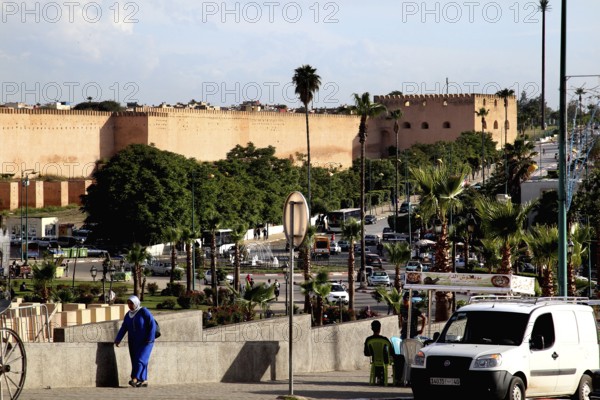 City view with historic walls and lively road traffic, Meknès, Fès-Meknes, Morocco