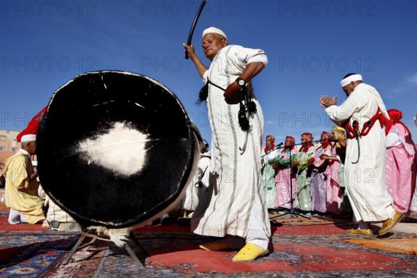 Traditional dances with drum accompaniment and colorful robes at the Fête des Roses, El Kelâa m'Gouna, Drâa-Tafilalet, Morocco