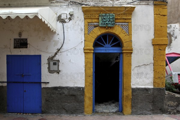 Historic façade with distinctive blue and yellow door frame in the old town, Essaouira, Marrakesh-Safi, Morocco