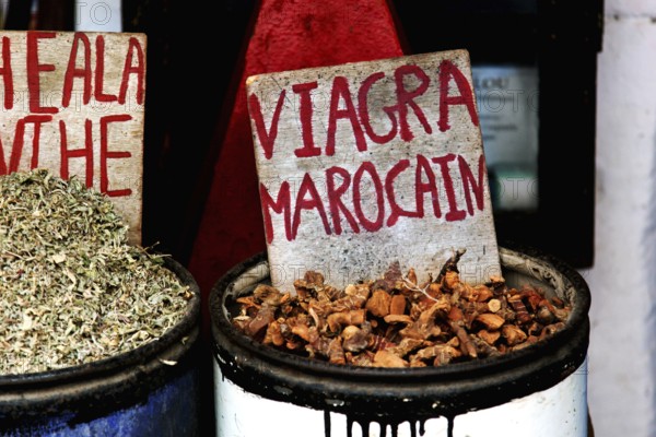 A market stall in the Essaouira souk with a sign 'Viagra Marocain', Essaouira, Morocco