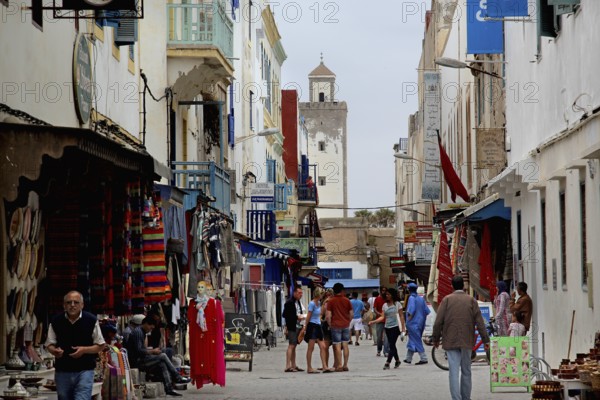 A busy street in the old town of Essouira with lots of shops and people, Essaouira, Morocco