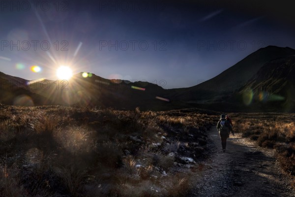 Sunrise over the trail in Tongariro Alpine Crossing, Tongariro National Park, North Island, New Zealand