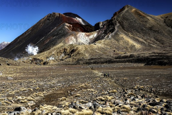 Rugged volcanic landscape of the Tongariro Alpine Crossing with two distinctive peaks, Tongariro National Park, Manawatu-Wanganui, New Zealand