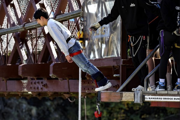 Bold jump from Kawarau Bridge into the depths, Queenstown, Kawarau Bridge, New Zealand
