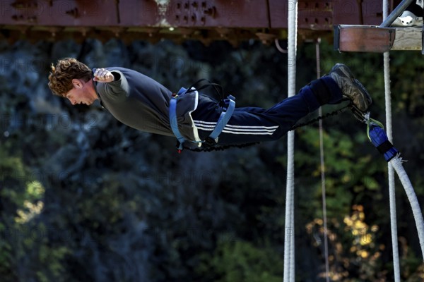 Person in free fall bungee jump from Kawarau Bridge, Queenstown, Kawarau Bridge, New Zealand
