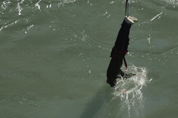 Single bungee jumper approaches the water of Kawarau Gorge, Queenstown, Otago, New Zealand