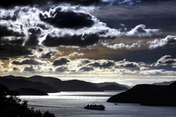 Drive along Queen Charlotte Sound under dramatic clouds, Queen Charlotte Sound, Marlborough, New Zealand