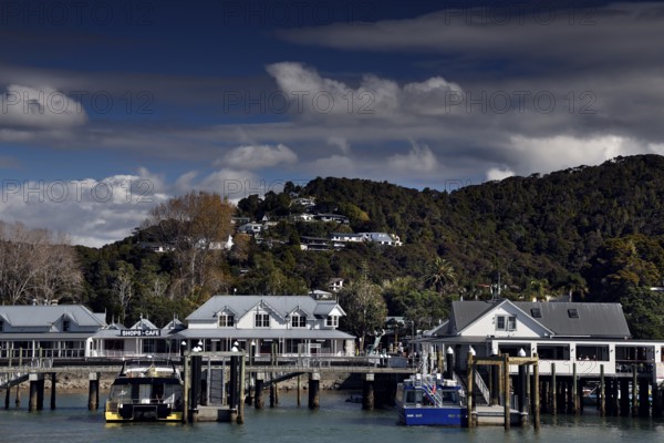 Cosy view of Paihia with harbour and wooded hills, Paihia, New Zealand